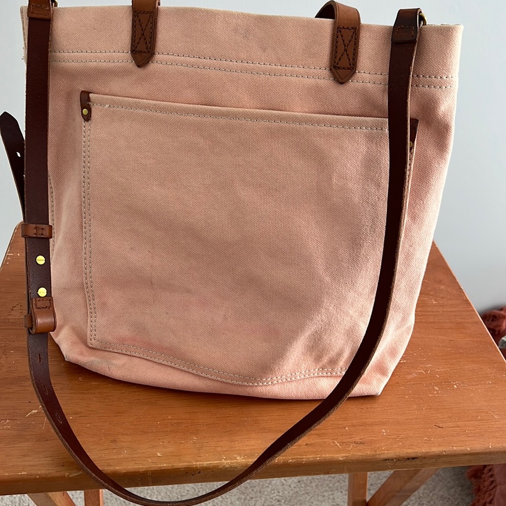 Canvas pale pink Madewell tote bag with leather straps.  Gently used. Great bag.